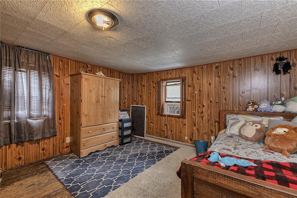 3456 Country Club Road Mount Pleasant, PA 15666 - Photo 35 of 39 a bedroom with furniture and a window