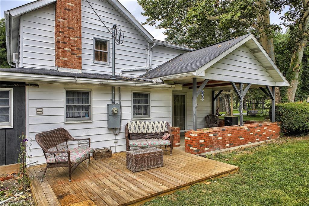 3456 Country Club Road Mount Pleasant, PA 15666 - Photo 6 of 39 a view of a house with backyard and sitting area