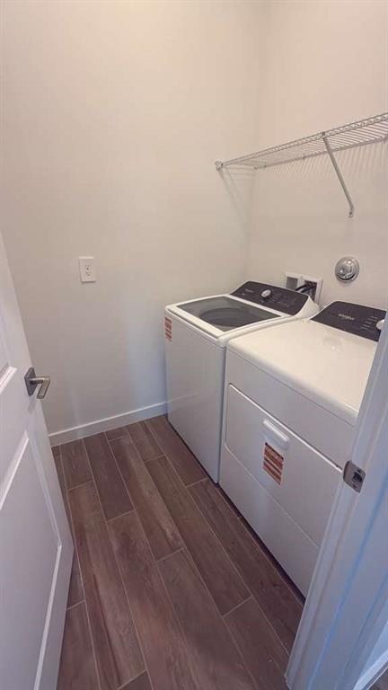 8780 Southwest Kanner Oaks Drive Stuart, FL 34997 - Photo 6 of 14 a utility room with dryer and washer