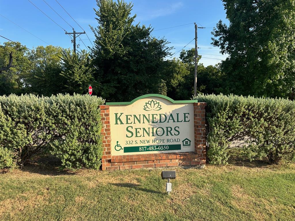 3775 Kennedale New Hope Road Kennedale, TX 76060 - Photo 11 of 13 Community / neighborhood sign featuring a yard and view of scattered trees