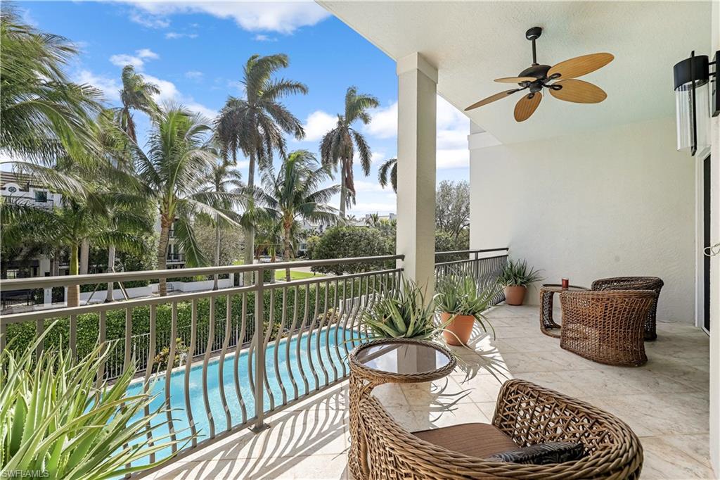 863 9th Avenue South, Unit 202 Naples, FL 34102 - Photo 12 of 35 a view of a balcony with furniture