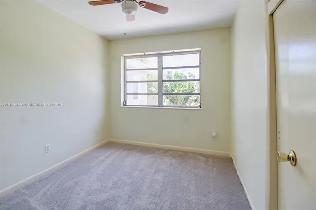 a kitchen with a sink stove and refrigerator