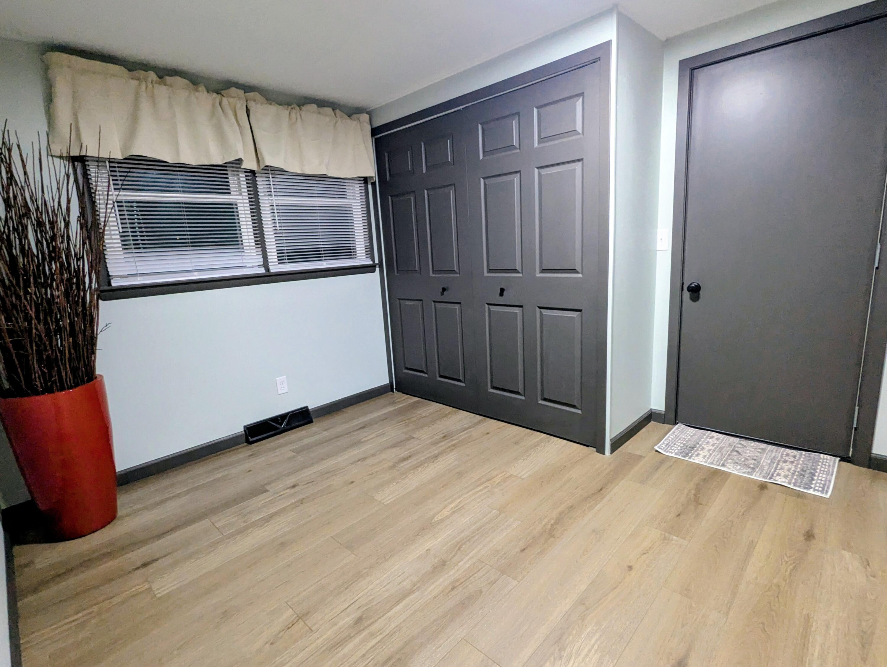 521 Ryan Road Hebron, IN 46341 - Photo 11 of 25 a kitchen with a refrigerator and microwave