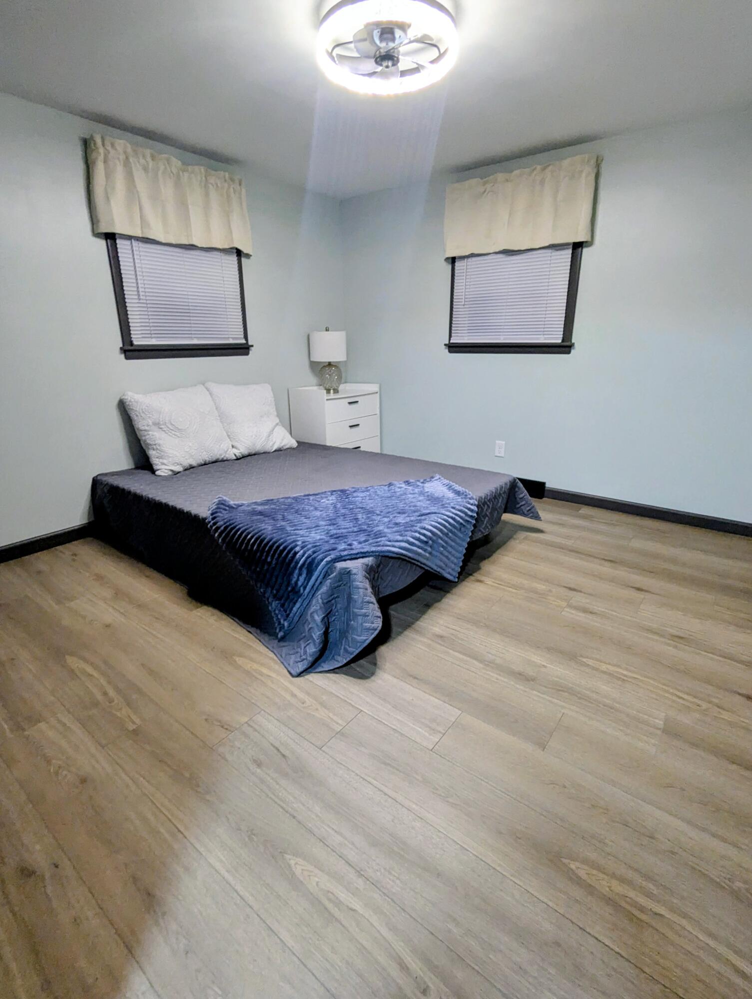 521 Ryan Road Hebron, IN 46341 - Photo 15 of 25 a bedroom with a bed and a painting on the wall