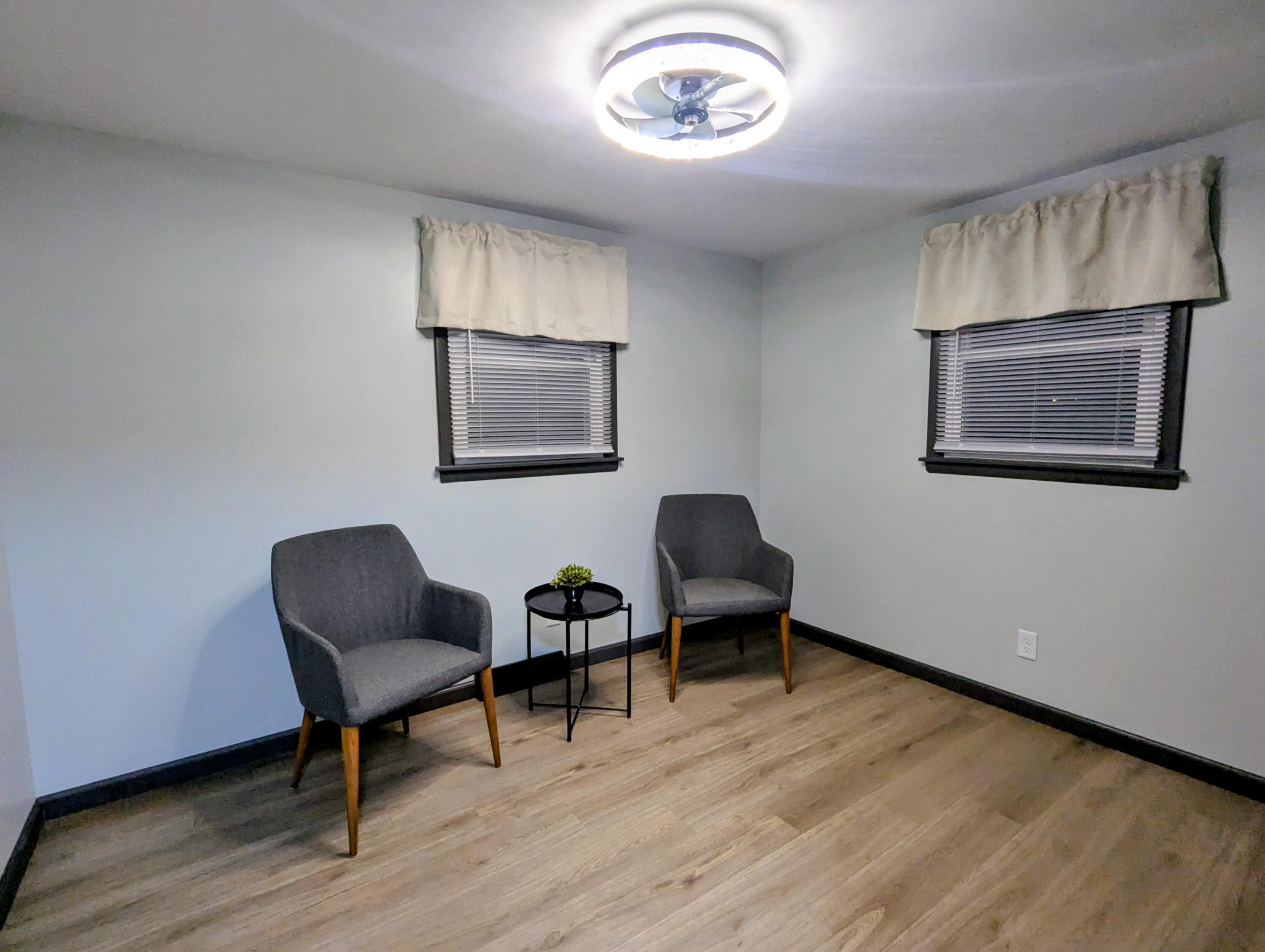 521 Ryan Road Hebron, IN 46341 - Photo 18 of 25 a view of a livingroom with furniture and wooden floor