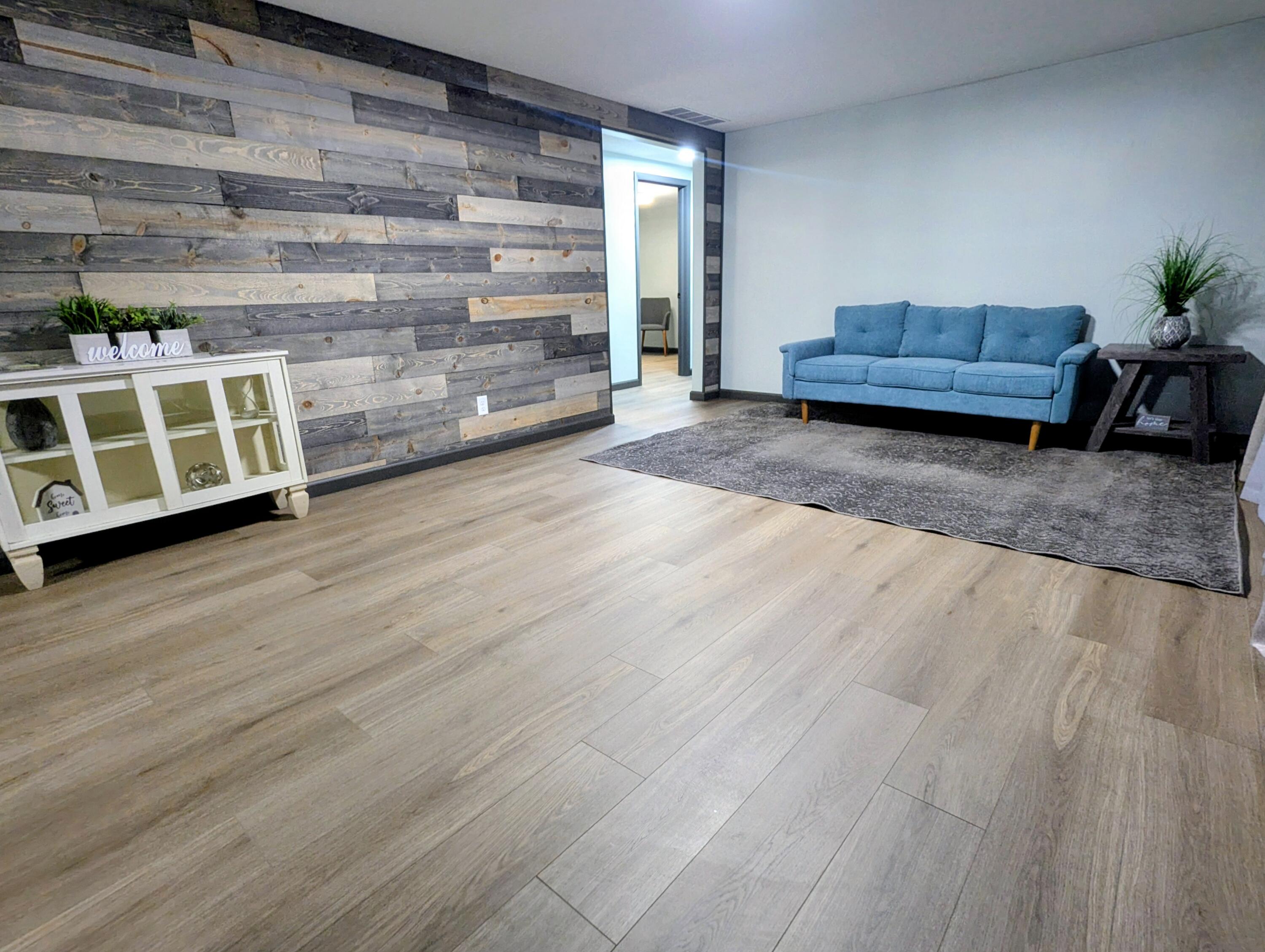 521 Ryan Road Hebron, IN 46341 - Photo 2 of 25 a view of room with wooden floor and a window