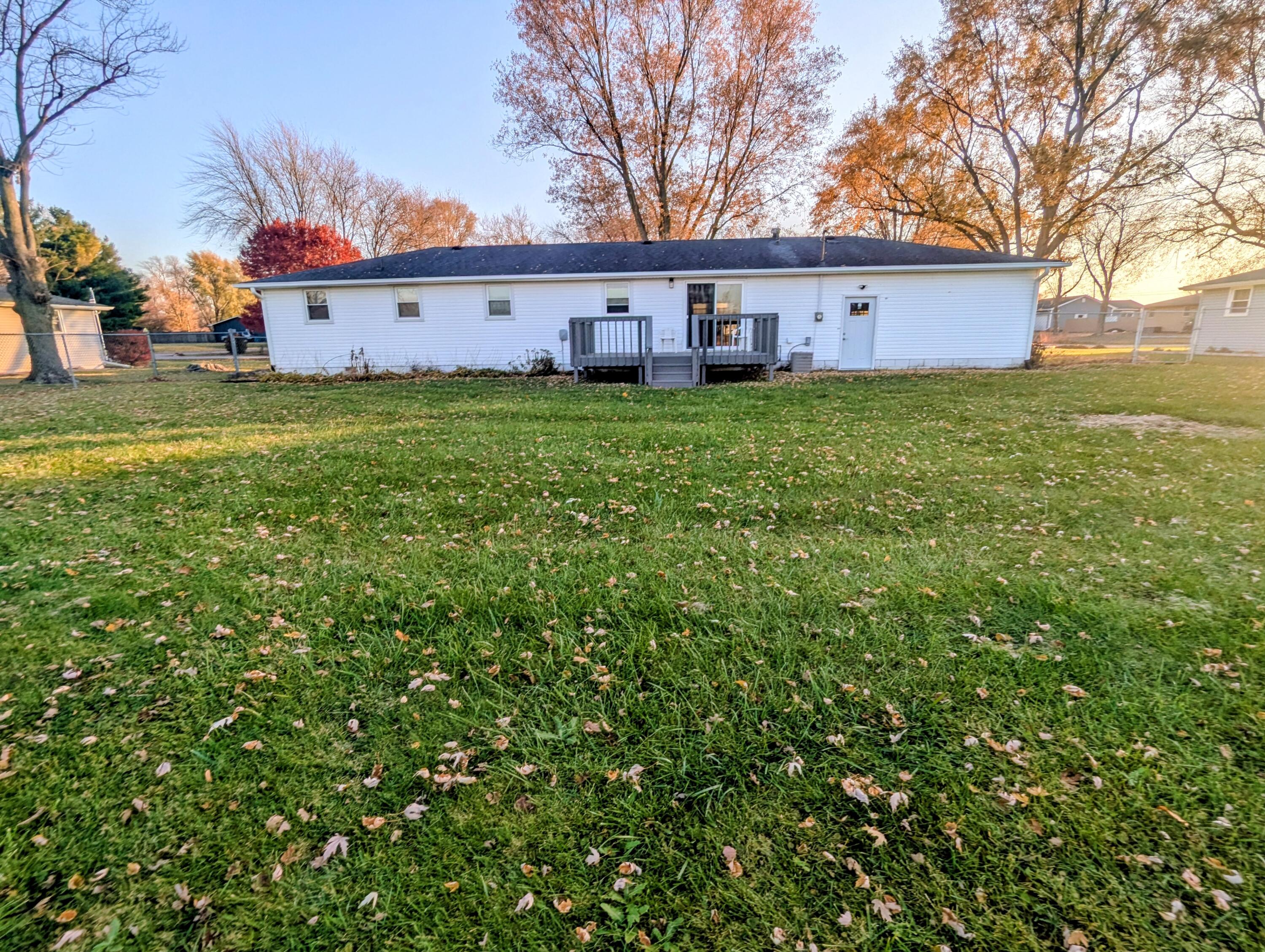 521 Ryan Road Hebron, IN 46341 - Photo 25 of 25 a view of a house with a big yard and large trees