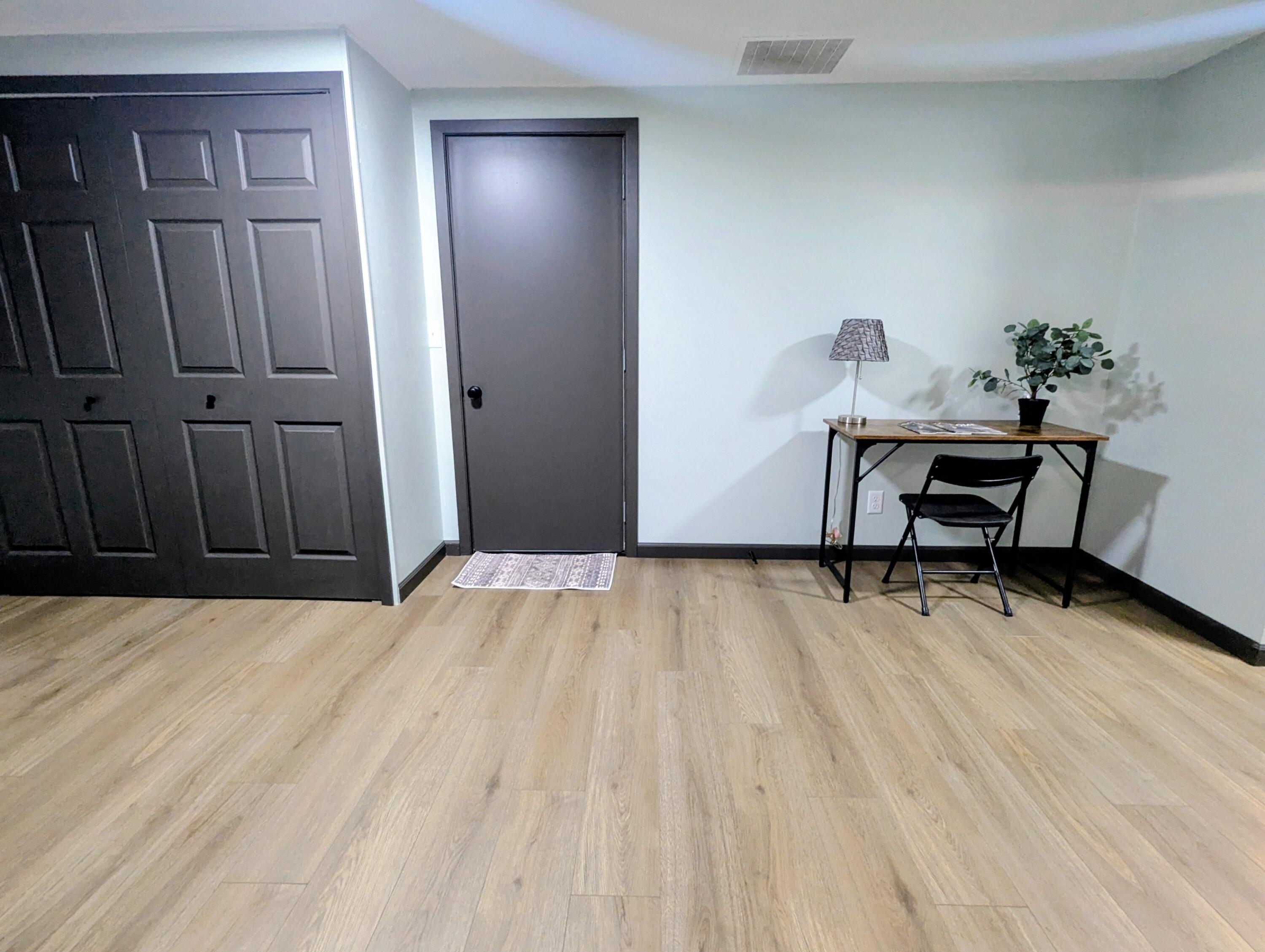 521 Ryan Road Hebron, IN 46341 - Photo 10 of 25 a workspace with furniture and wooden floor
