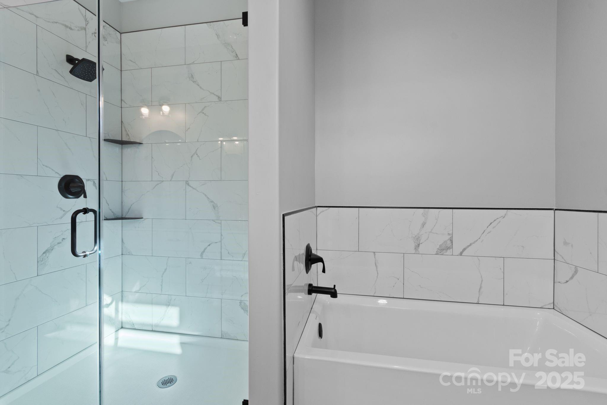 80 Peyton Elaine Road Clyde, NC 28721 - Photo 17 of 28 a bathroom with a bathtub