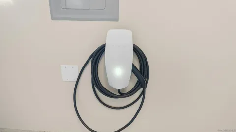 an aerial view of a building with beach