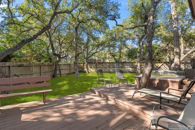 a view of yard covered with snow in front of house