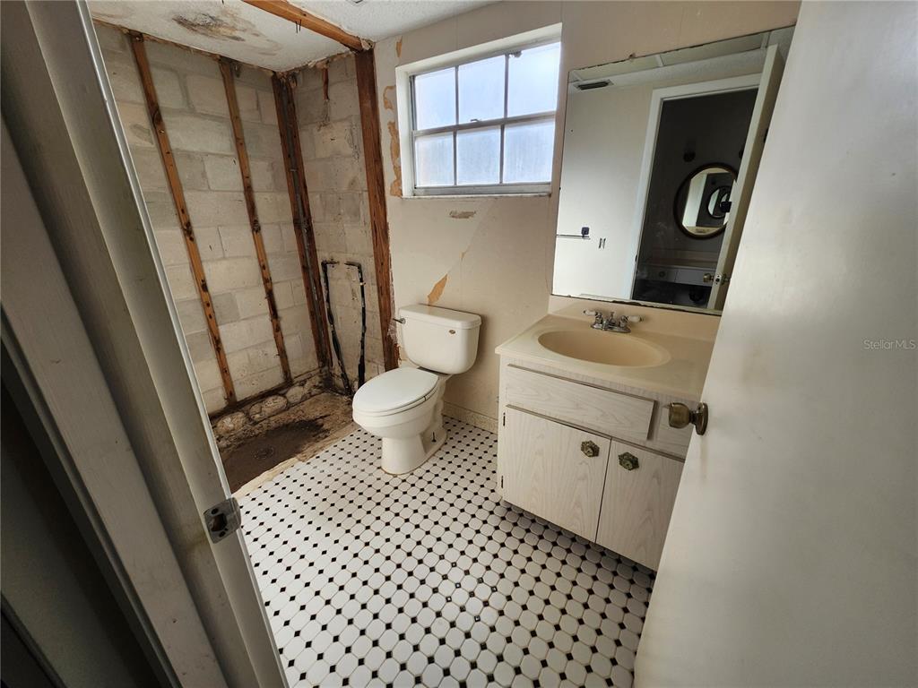 4060 Sail Drive New Port Richey, FL 34652 - Photo 12 of 20 a bathroom with a sink and a toilet