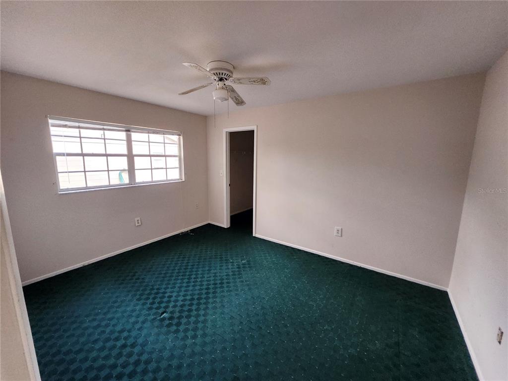 4060 Sail Drive New Port Richey, FL 34652 - Photo 13 of 20 an empty room with a window