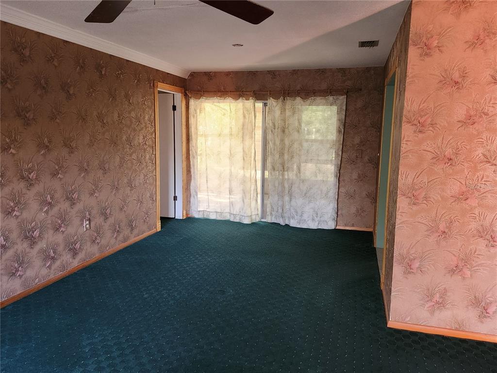 4060 Sail Drive New Port Richey, FL 34652 - Photo 4 of 20 a view of an empty room with a window