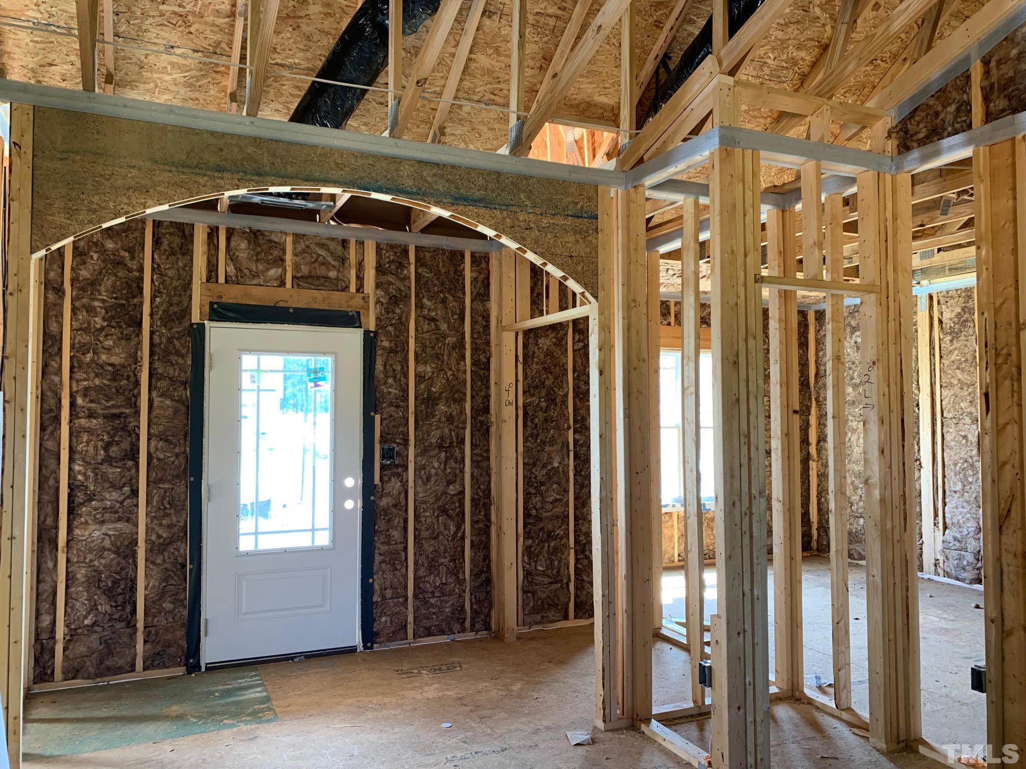 88 Bodacious Lane Benson, NC 27504 - Photo 7 of 13 a view of a door and a window