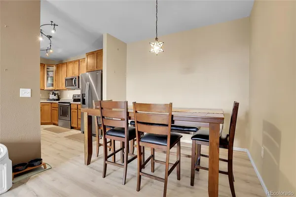 a view of a dining room with furniture