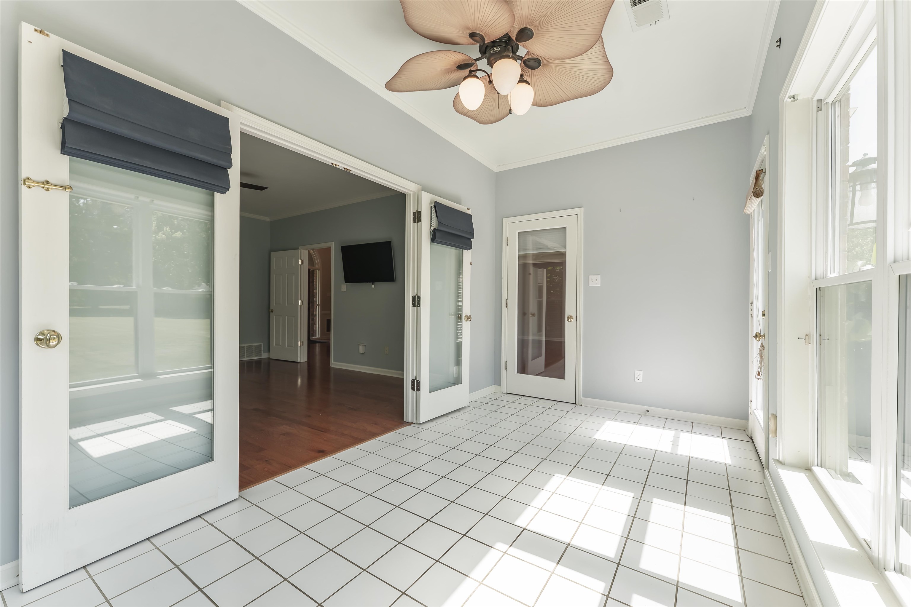 4279 High Plains Road Bartlett, TN 38135 - Photo 17 of 37 Bright room featuring white square tile flooring and light gray walls