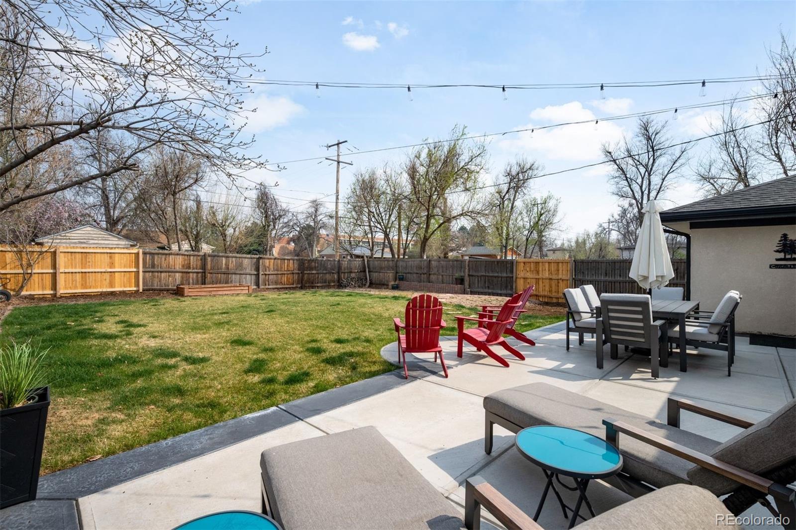 3000 Ivy Street Denver, CO 80207 - Photo 17 of 26 a view of yard with patio