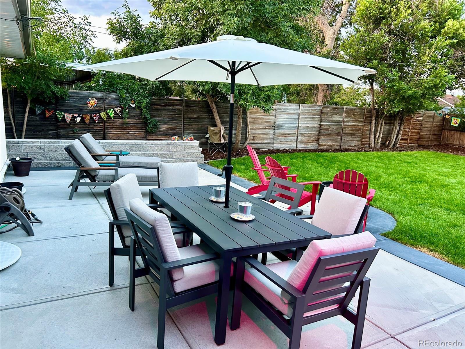 3000 Ivy Street Denver, CO 80207 - Photo 25 of 26 a view of yard with seating area and green space