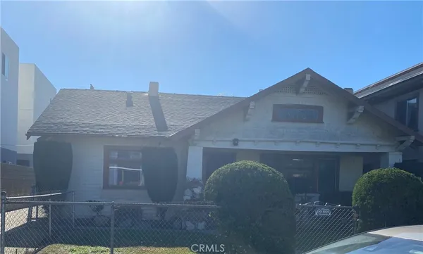 a front view of a house with balcony