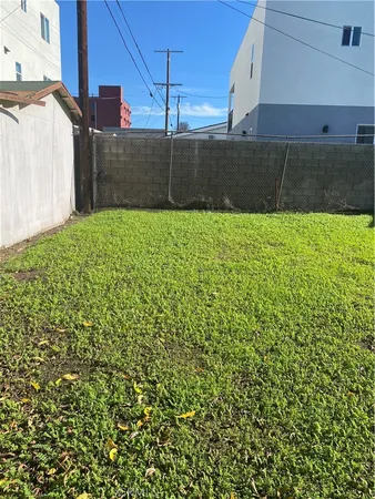 a view of yard and front view of a house