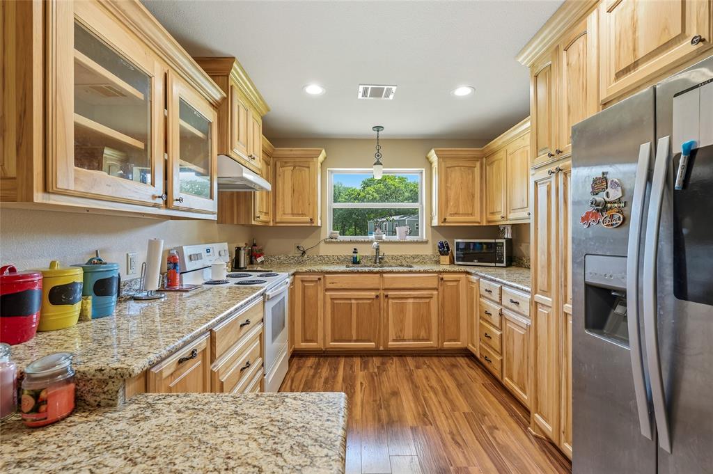 1111 Riley Road Whitesboro, TX 76273 - Photo 19 of 34 second living space kitchen