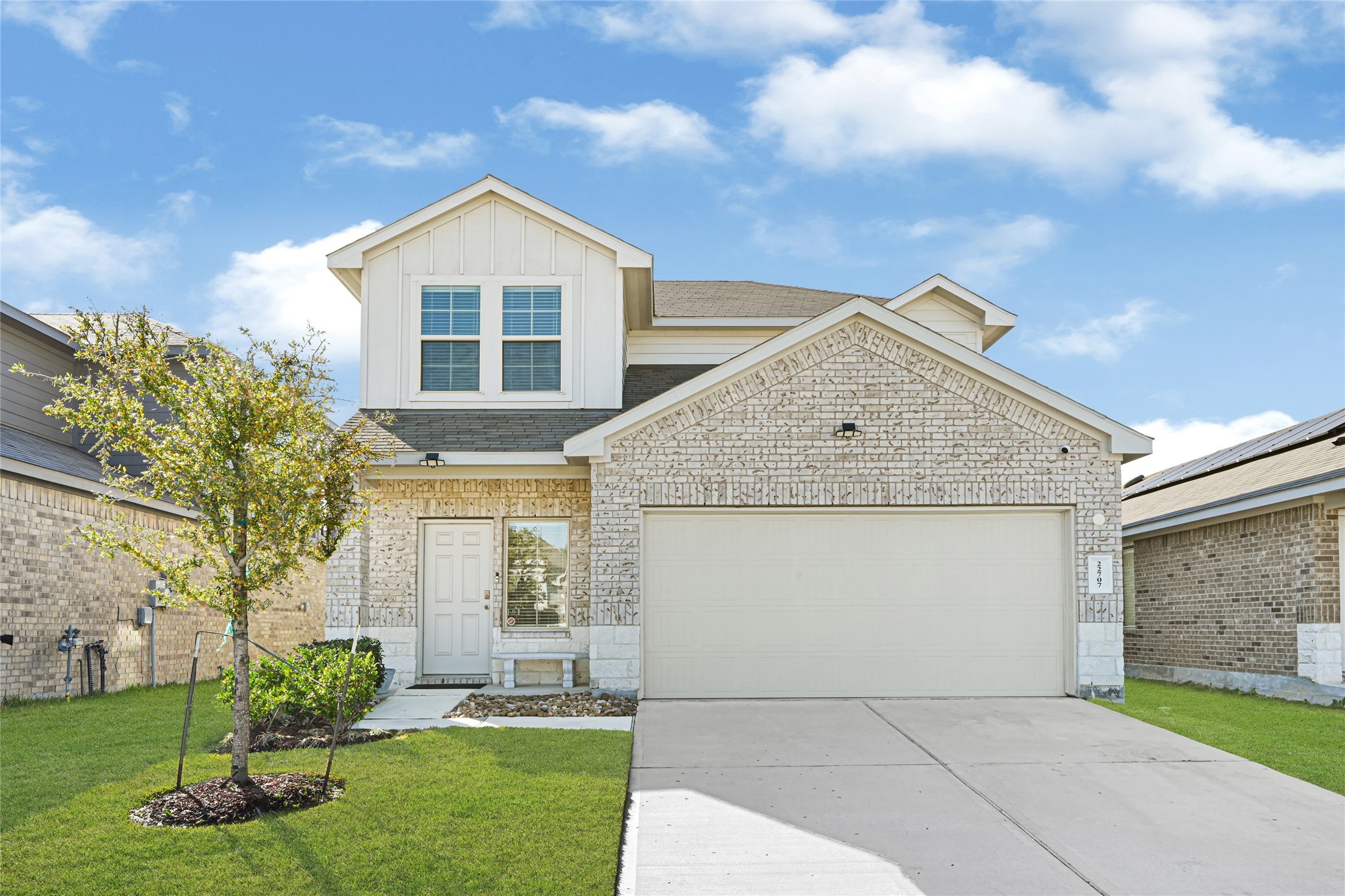 22707 Yarmony Vista Trail Spring, TX 77373 - Photo 1 of 26 a front view of a house with a yard and garage