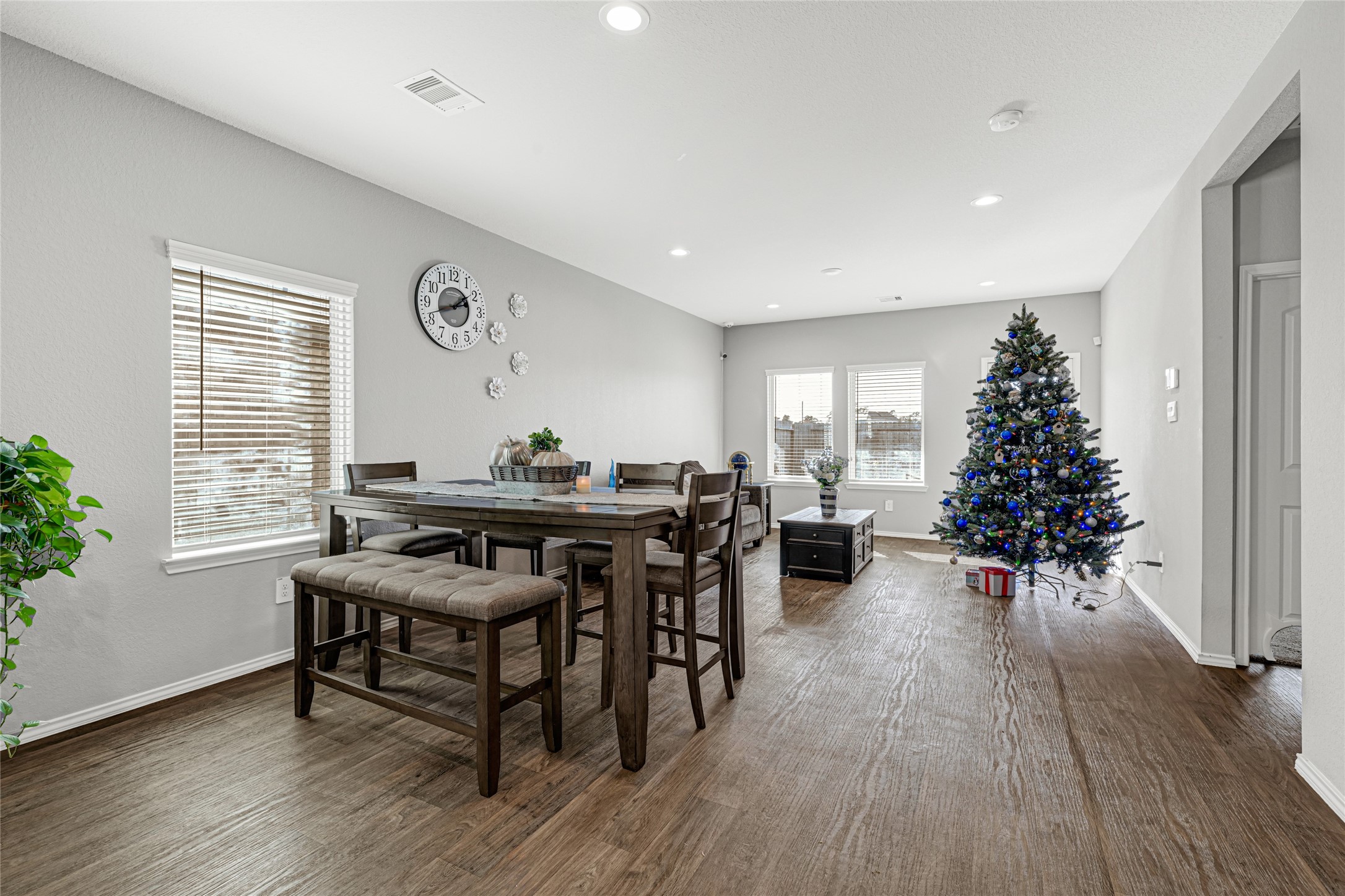 22707 Yarmony Vista Trail Spring, TX 77373 - Photo 13 of 26 a living room with furniture a window and a potted plant