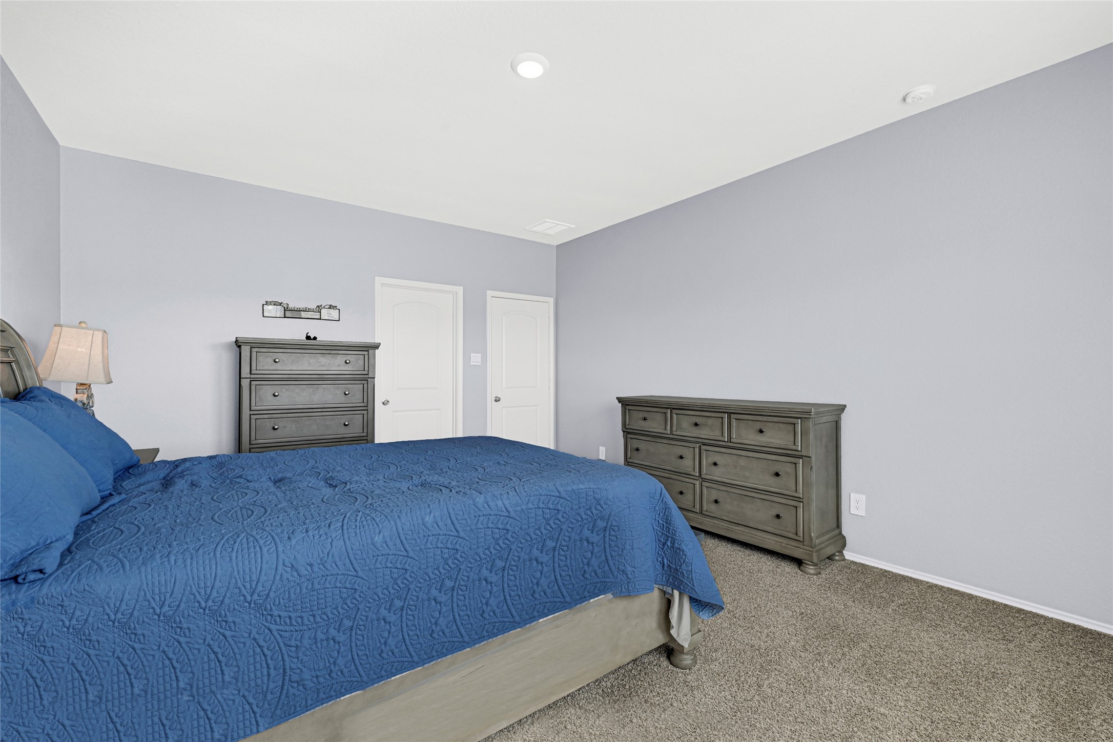 22707 Yarmony Vista Trail Spring, TX 77373 - Photo 15 of 26 a bedroom with a bed and furniture