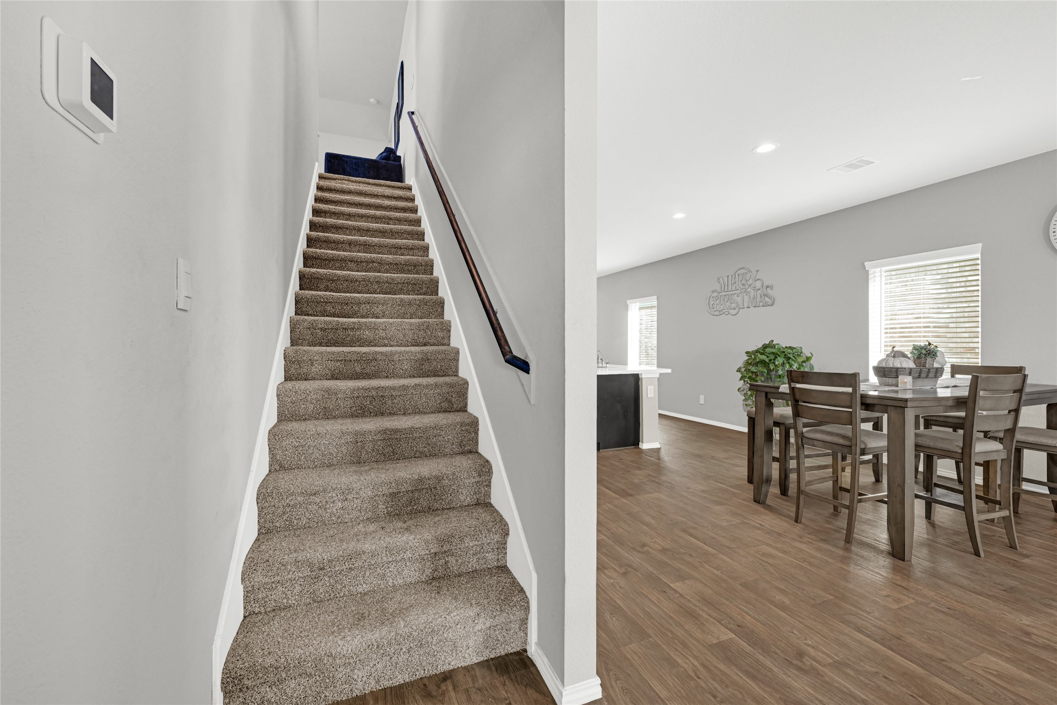 22707 Yarmony Vista Trail Spring, TX 77373 - Photo 19 of 26 a dining room with furniture and wooden floor