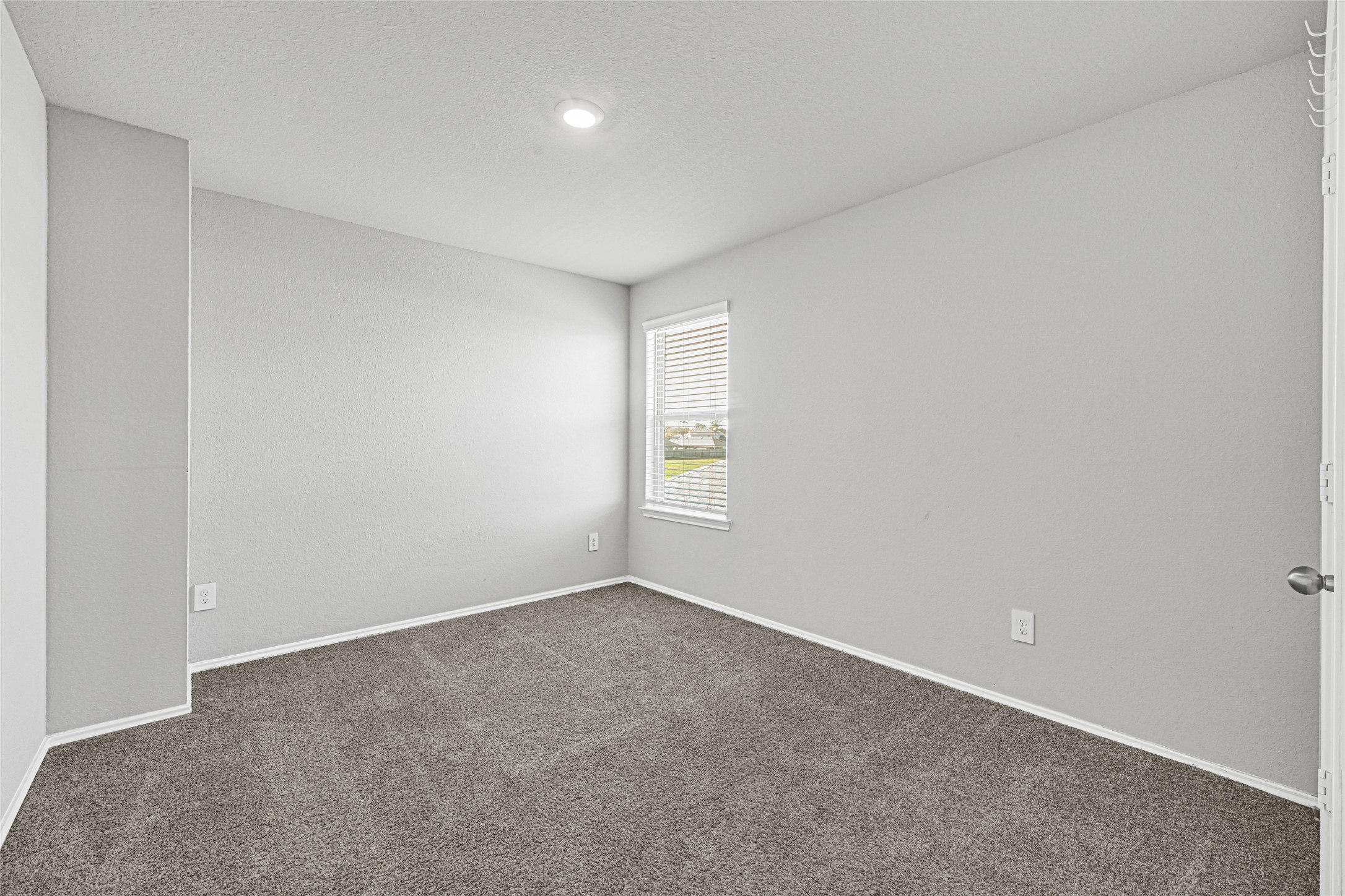 22707 Yarmony Vista Trail Spring, TX 77373 - Photo 22 of 26 a view of an empty room with a window