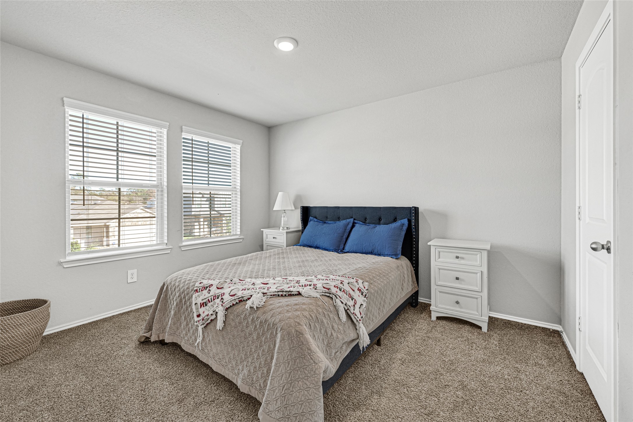 22707 Yarmony Vista Trail Spring, TX 77373 - Photo 23 of 26 a bedroom with a bed and a window