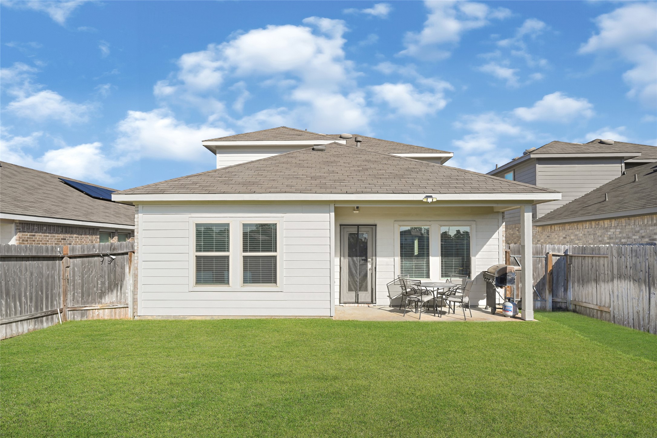 22707 Yarmony Vista Trail Spring, TX 77373 - Photo 26 of 26 a front view of house with yard and outdoor seating