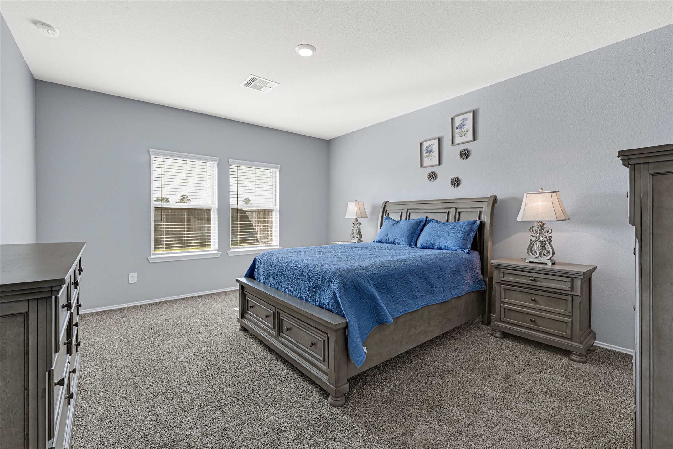 22707 Yarmony Vista Trail Spring, TX 77373 - Photo 4 of 26 a spacious bedroom with a bed and a window