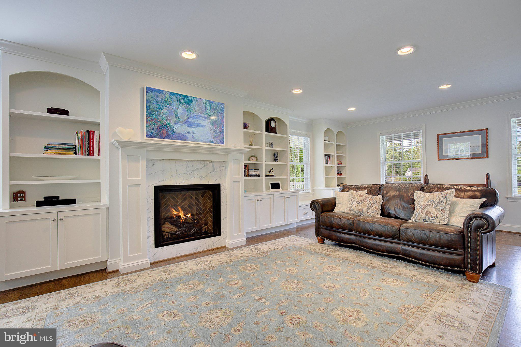 980 Apple Lane Solomons, MD 20629 - Photo 6 of 82 Cozy living room with a warm fireplace.