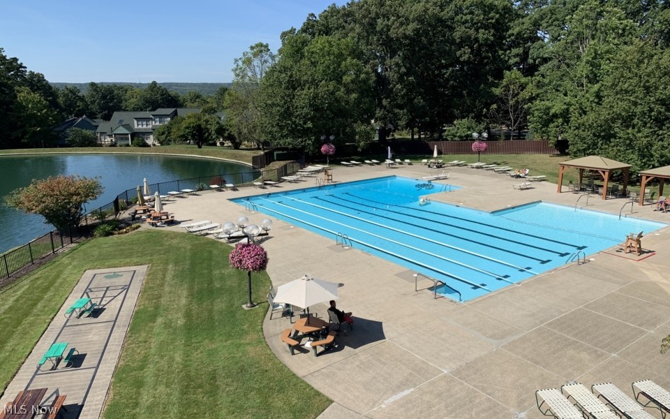 985 Canyon View Road, Unit 202B Northfield, OH 44067 - Photo 26 of 29 Outdoor Swimming pool complete with lounge chairs so come relax
