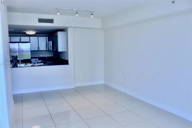 a view of a kitchen with a sink