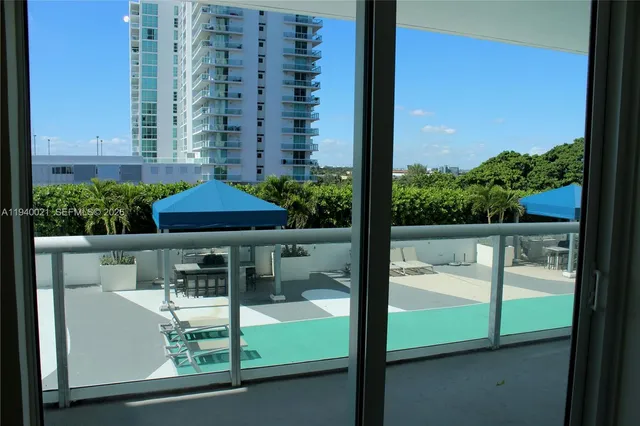 a view of balcony with a potted plant