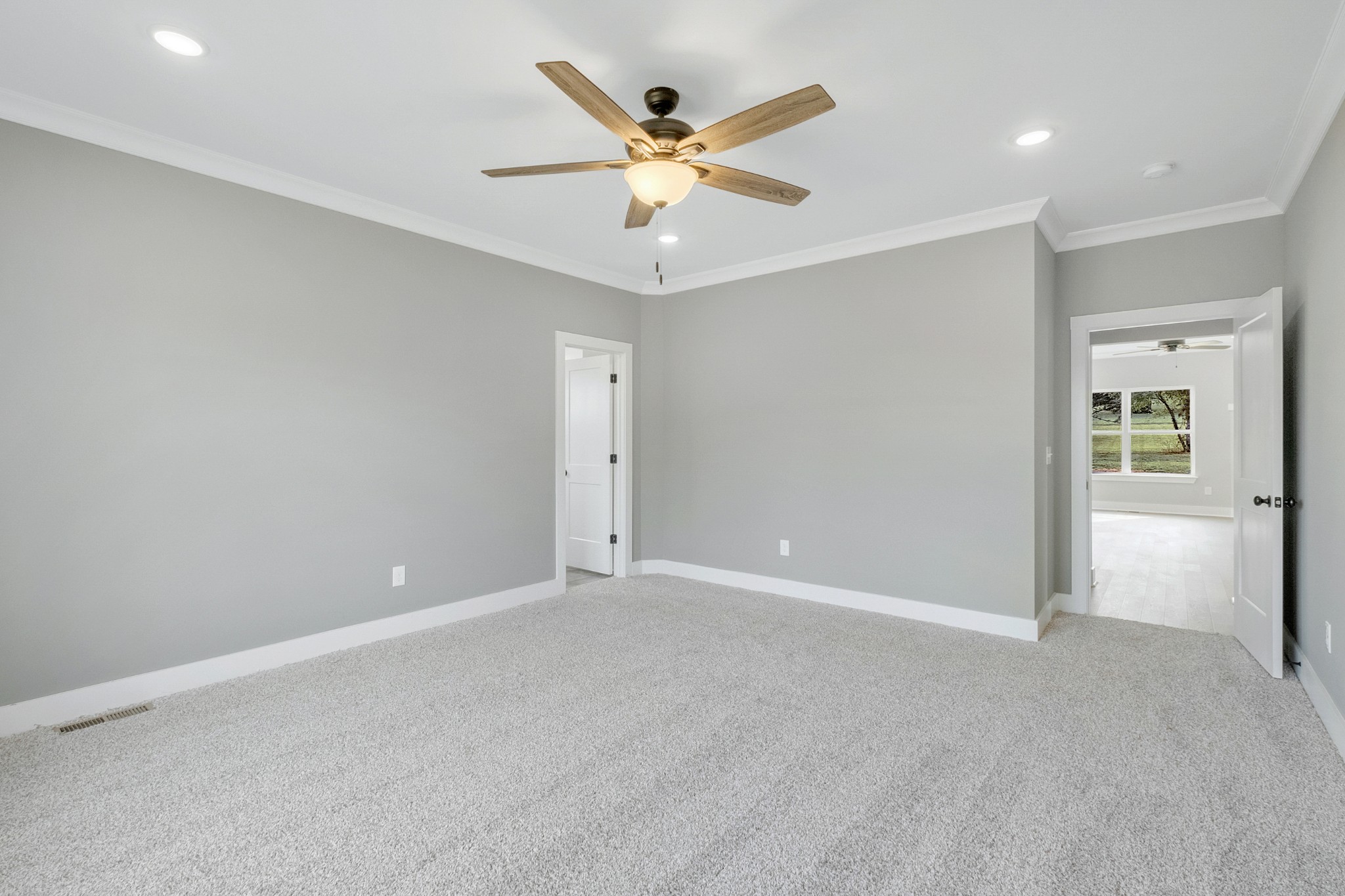 1227 Maple Hill Road Lebanon, TN 37087 - Photo 18 of 43 an empty room with closet and ceiling fan