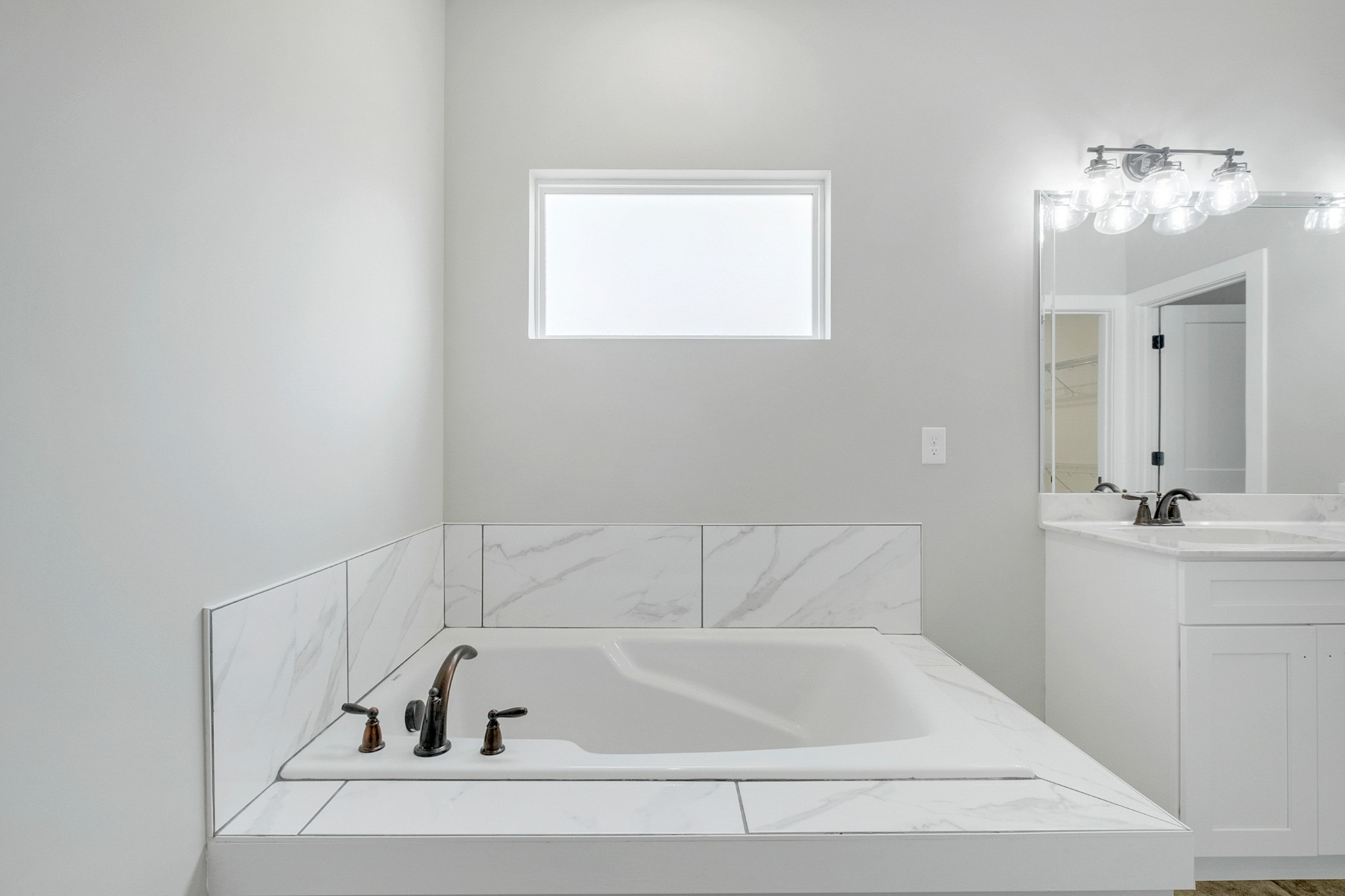 1227 Maple Hill Road Lebanon, TN 37087 - Photo 25 of 43 a bathroom with a bathtub and a sink
