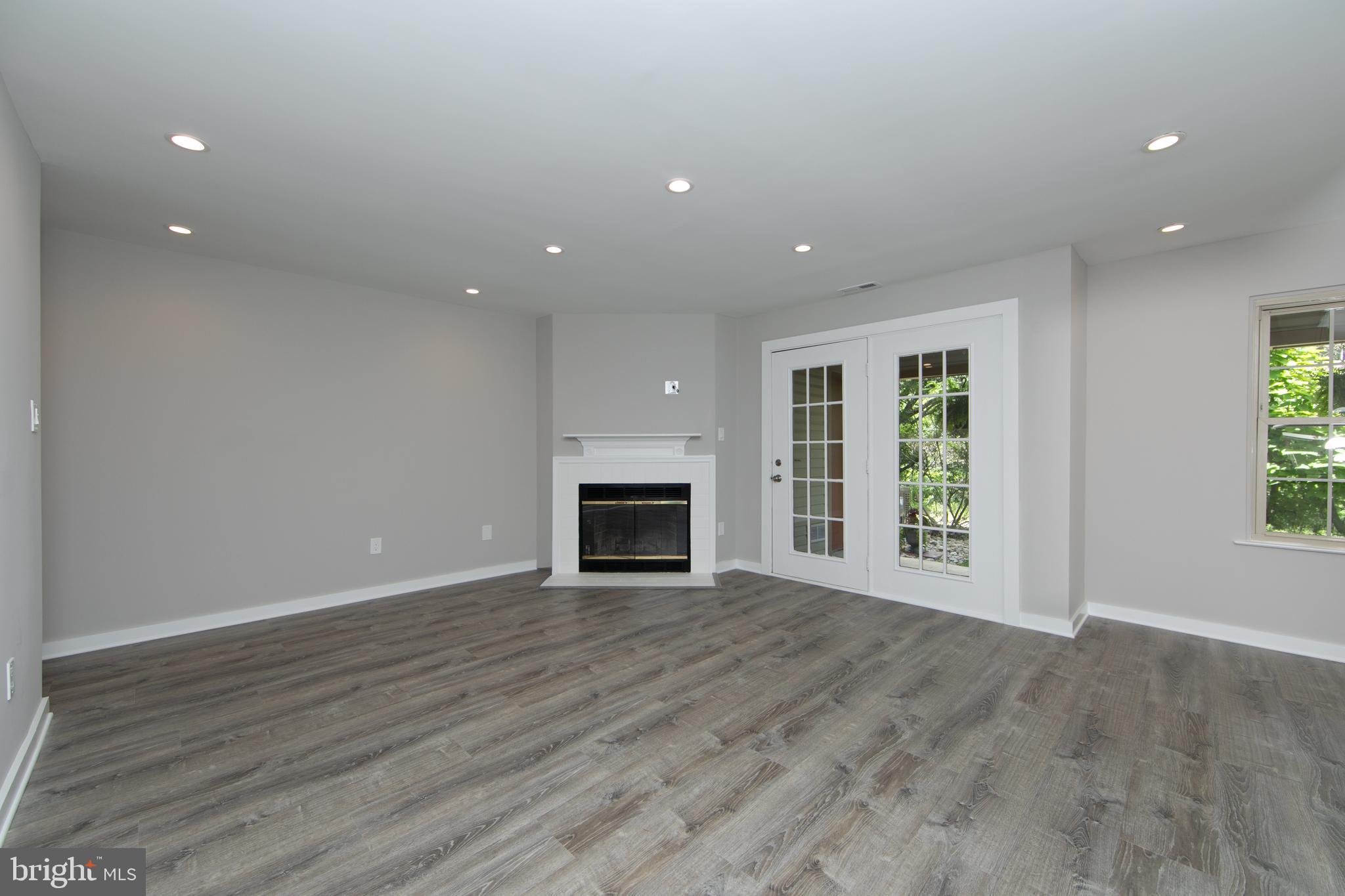 306 Tavistock Road Cherry Hill, NJ 08034 - Photo 6 of 33 Great room with recessed lights and door to patio.