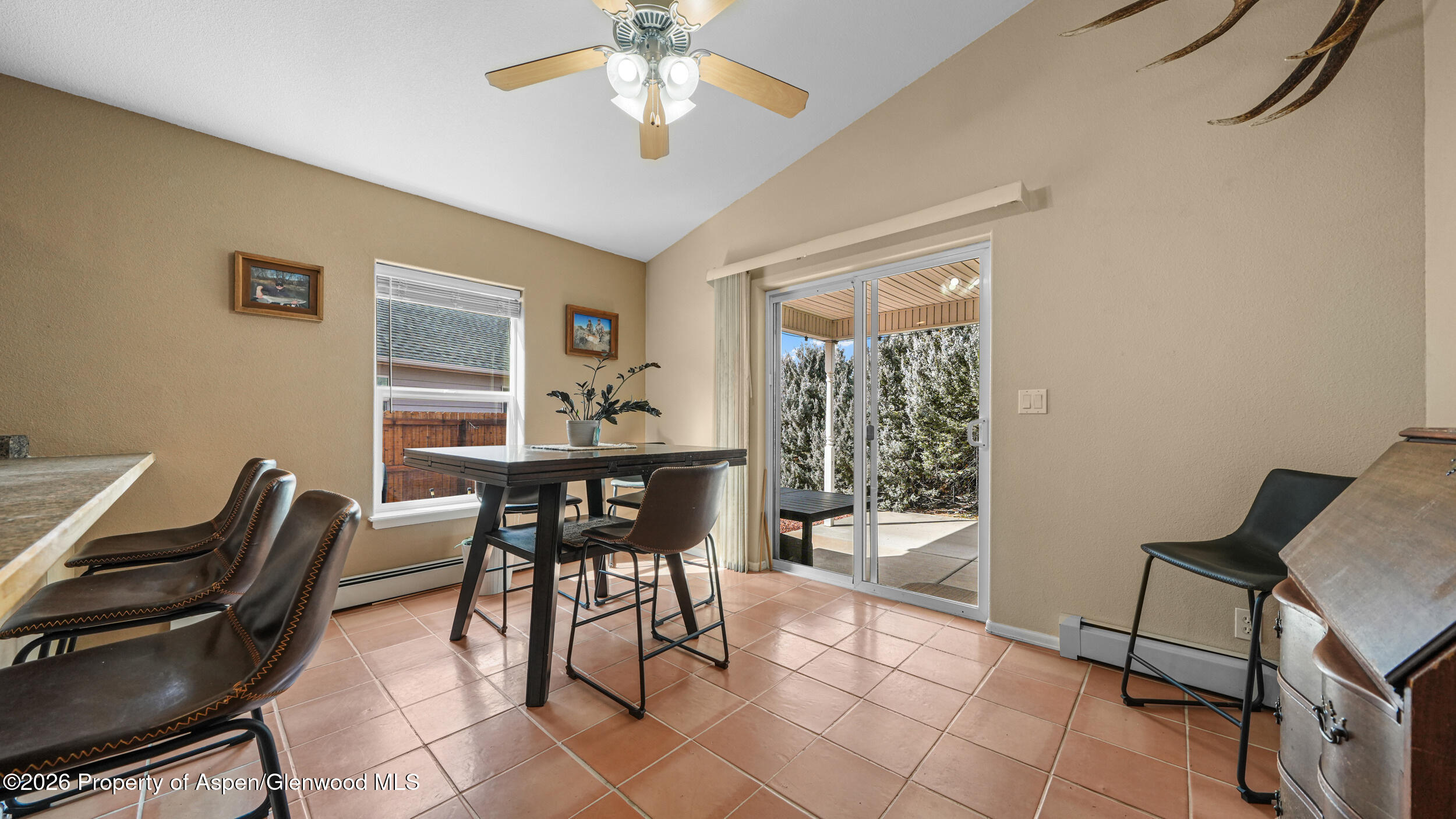 2703 Acacia Court Rifle, CO 81650 - Photo 11 of 29 a view of a dining room with furniture and a window