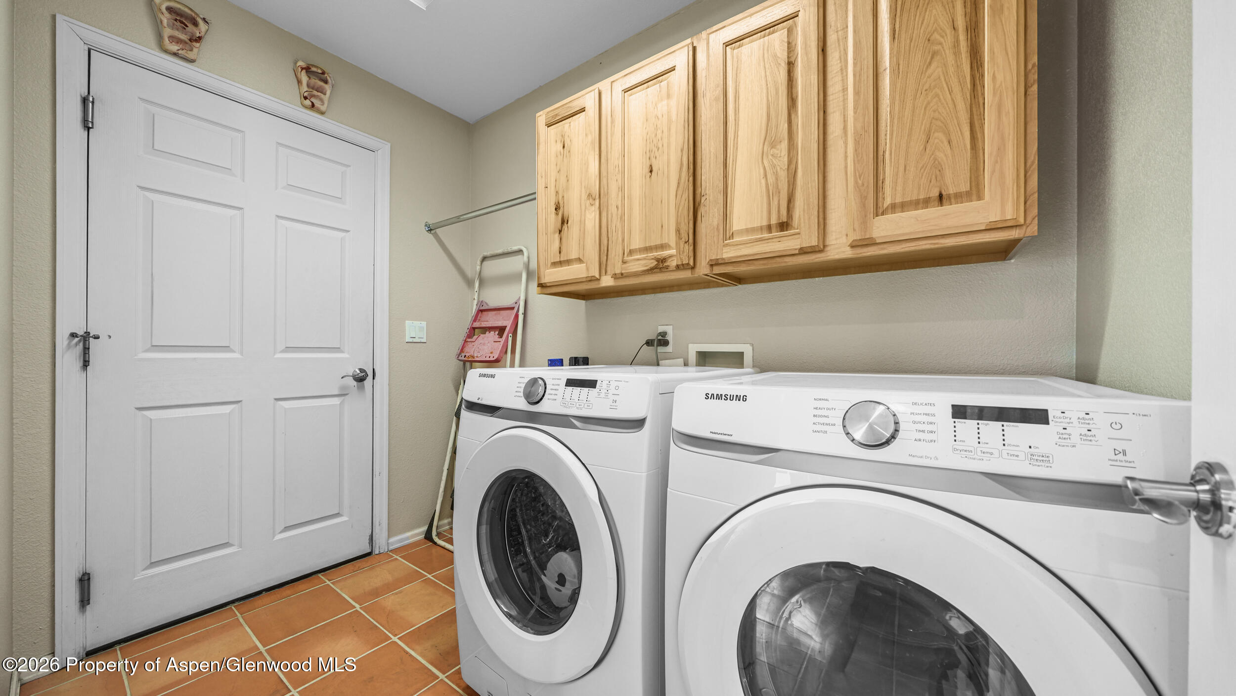 2703 Acacia Court Rifle, CO 81650 - Photo 12 of 29 a utility room with dryer and washer