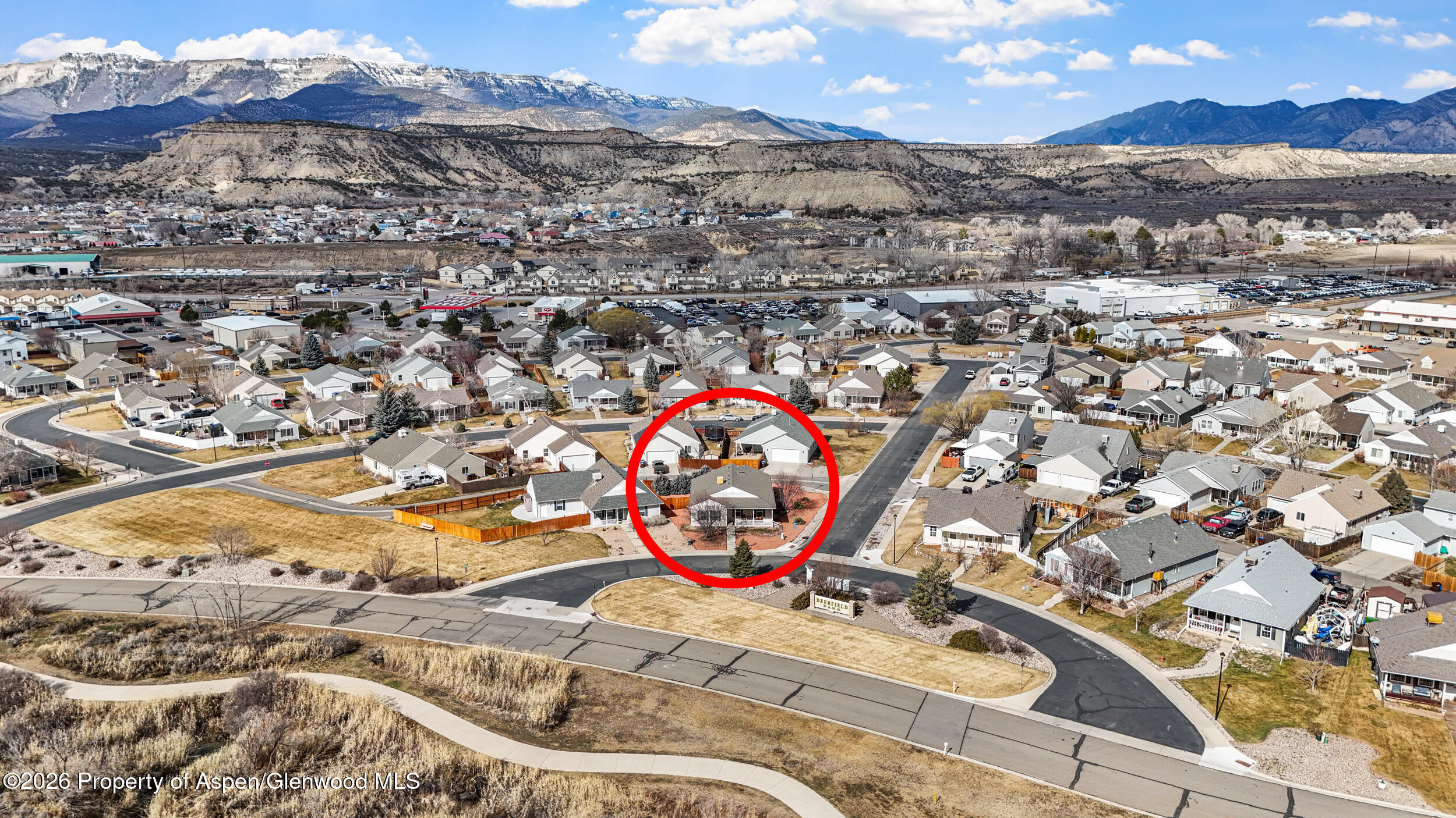 2703 Acacia Court Rifle, CO 81650 - Photo 29 of 29 an aerial view of a swimming pool with a mountain