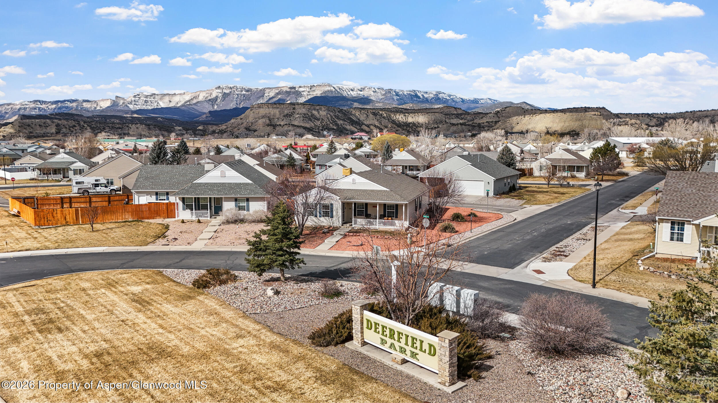 2703 Acacia Court Rifle, CO 81650 - Photo 3 of 29 a view of a city with tall buildings