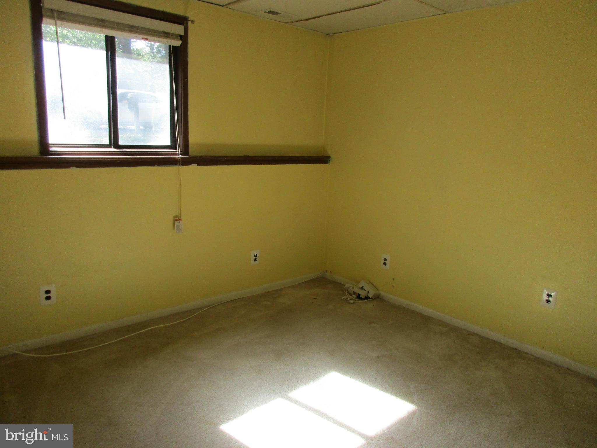 1635 Bay Ridge Road Edgewater, MD 21037 - Photo 12 of 15 an empty room with a window