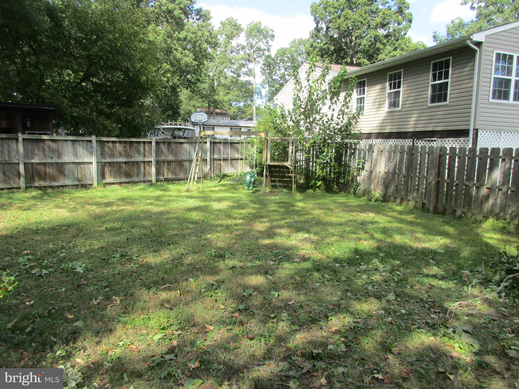 1635 Bay Ridge Road Edgewater, MD 21037 - Photo 15 of 15 a view of a backyard with a large tree