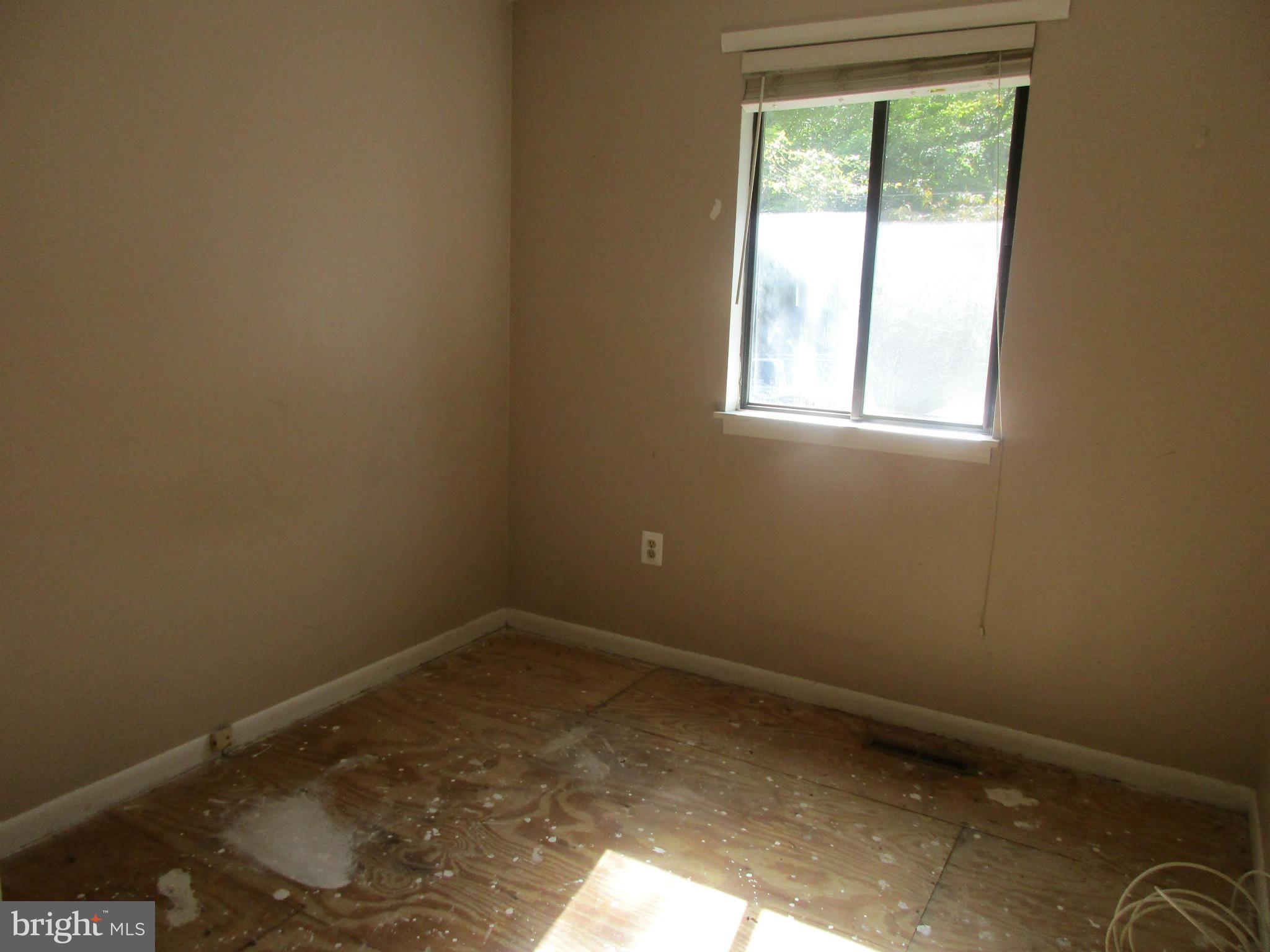 1635 Bay Ridge Road Edgewater, MD 21037 - Photo 7 of 15 an empty room with a window