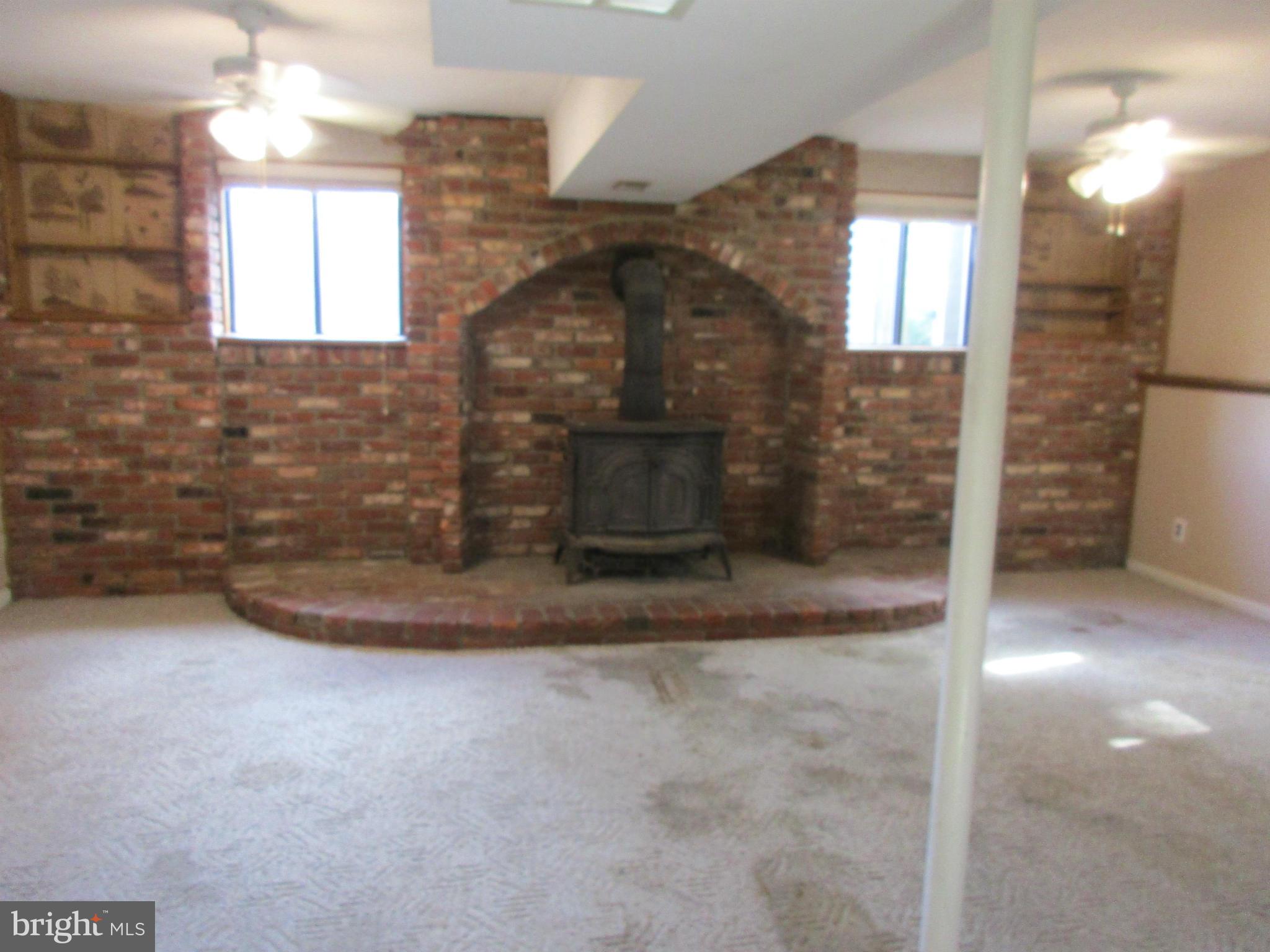 1635 Bay Ridge Road Edgewater, MD 21037 - Photo 9 of 15 a view of a fireplace in a room