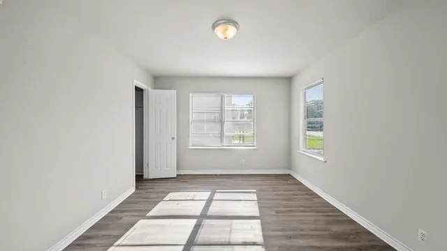 a view of a room with windows